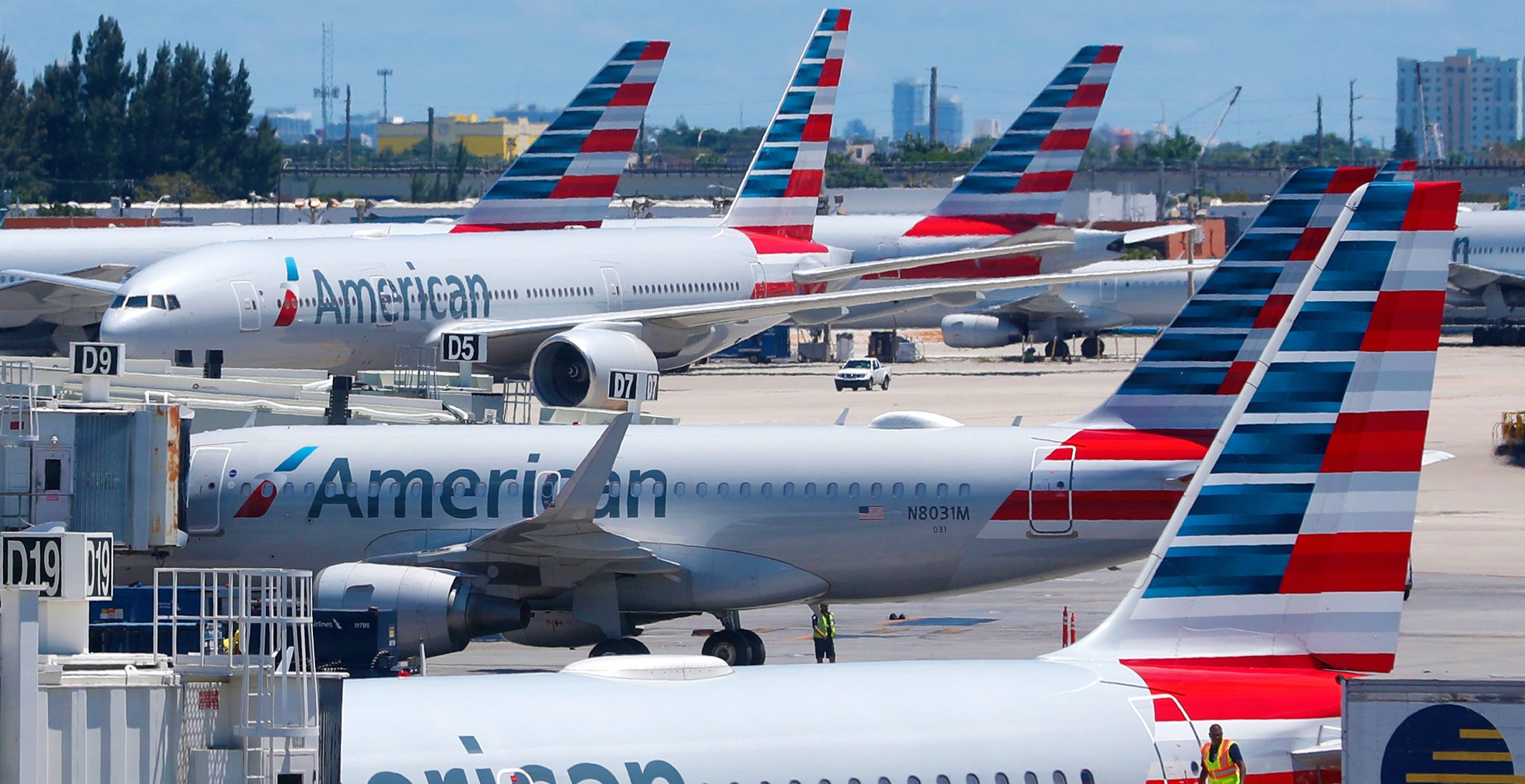 Lack of staffs forces American Airlines to cancel hundreds of flights, as travel demand approaches pre-pandemic level .